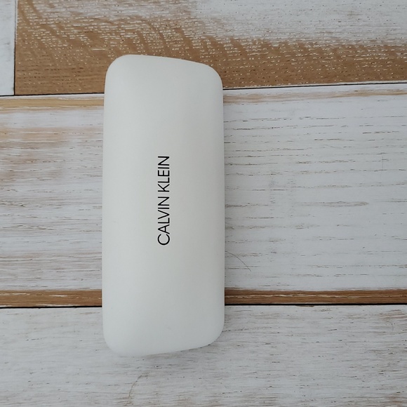 Calvin KLIEN Aviator Sunglasses with Silver Frame and Purple Lenses - Picture 5 of 8